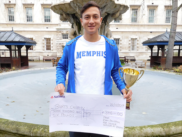 Fundraiser holding giant cheque