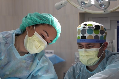Two surgeons in an operating theatre