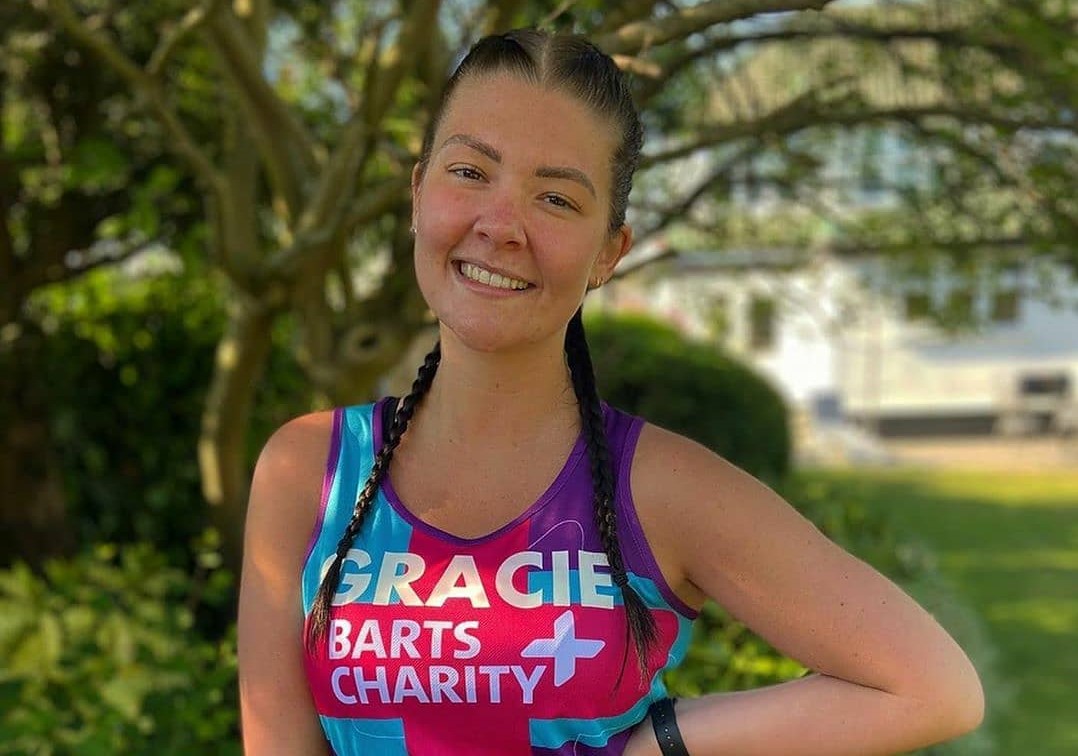 Fundraiser wearing Barts Charity running vest