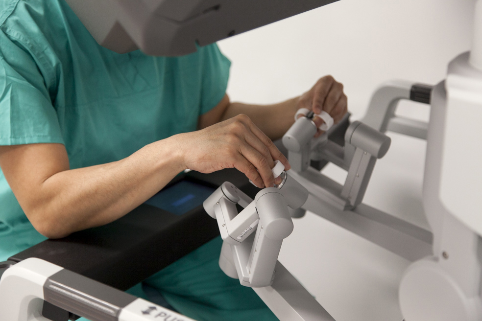 Surgeon at the controls of DaVinci surgical robot