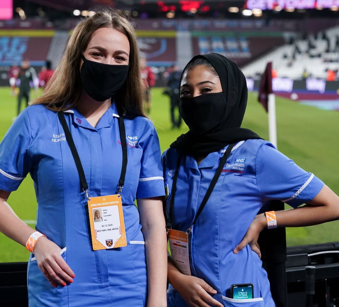 Flagbearers Bianca and Nasiha from Newham Hospital 1