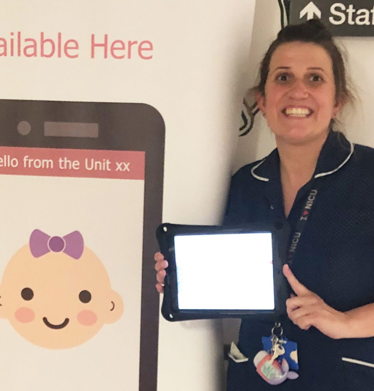 A nurse holding an iPad