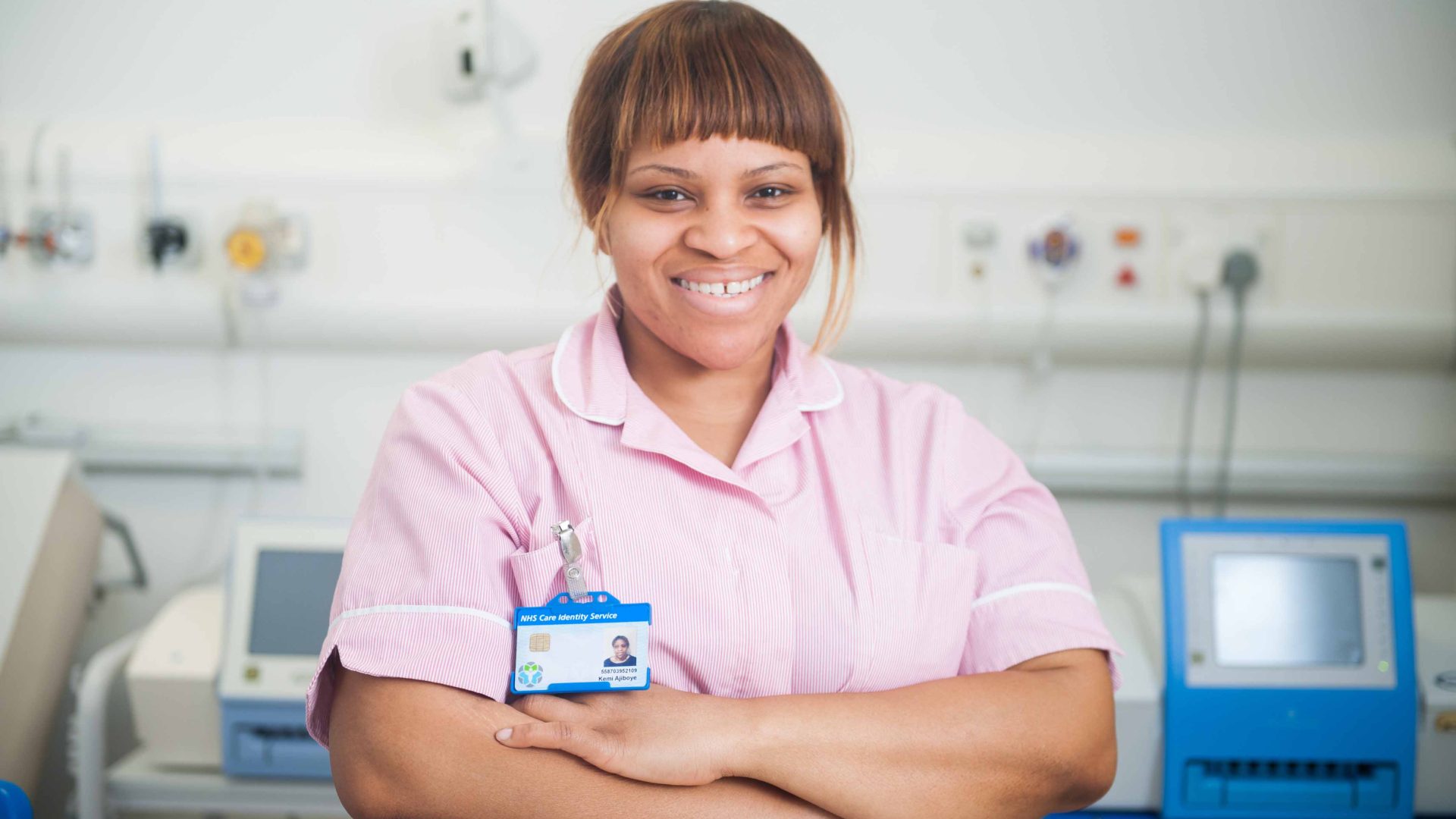 a member of staff smiling at The Royal London Hospital