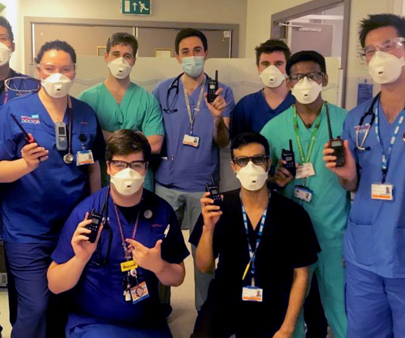 NHS staff with walkie-talkies