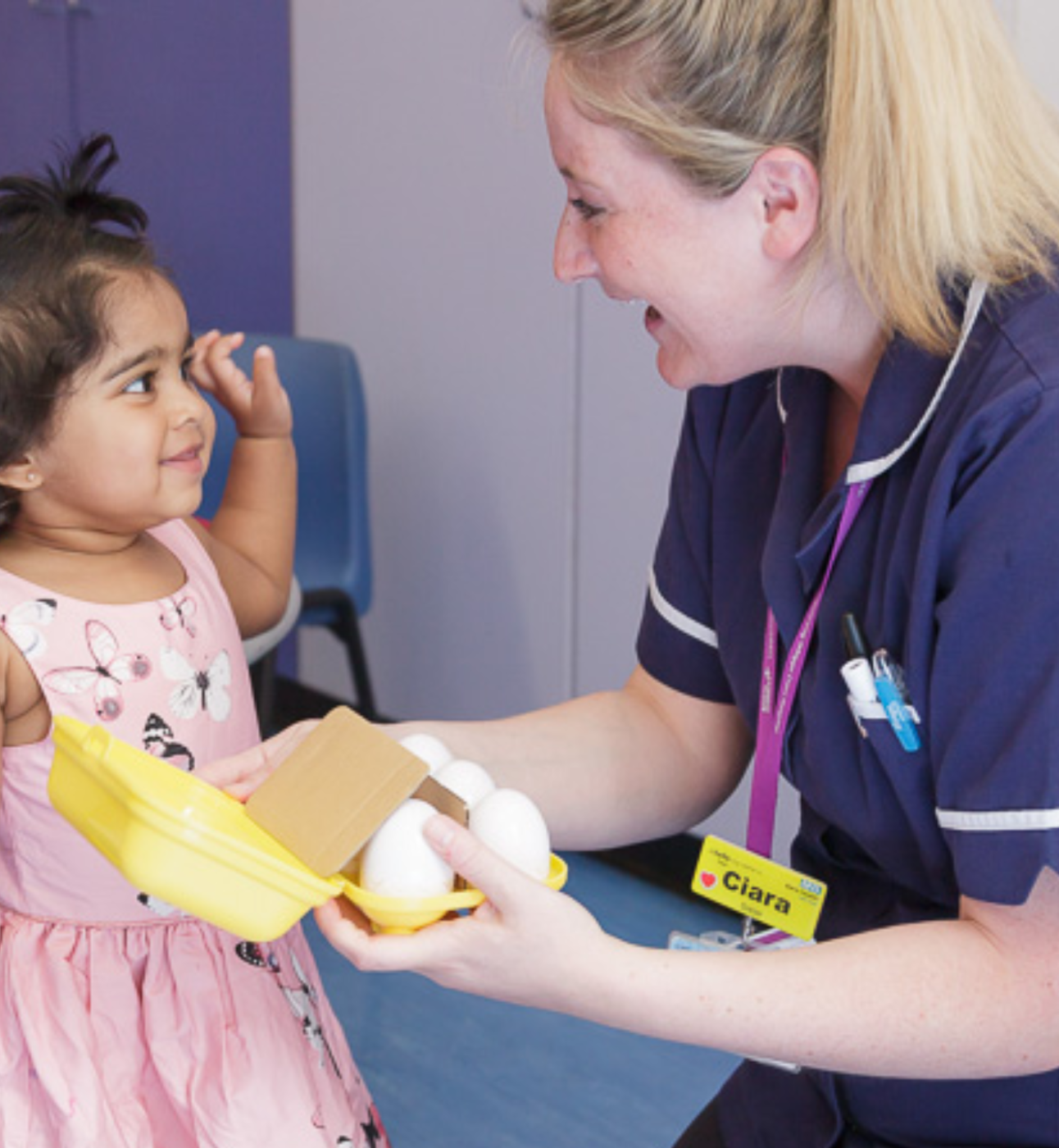 young patient with play team at royal london hospital