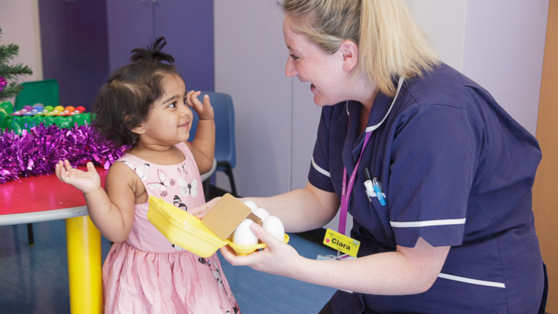 young patient with play team at royal london hospital