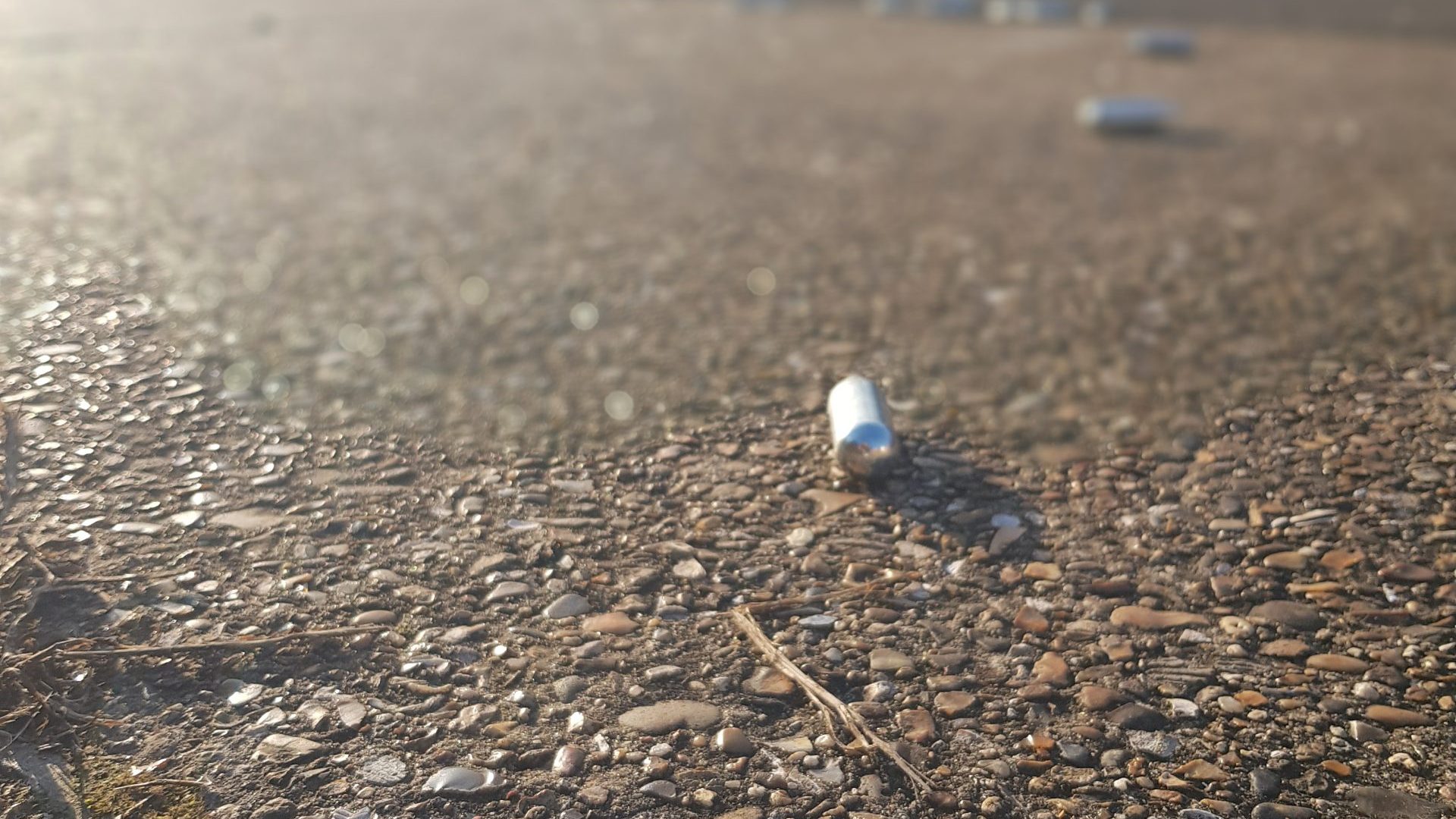 Used laughing gas canisters on the ground