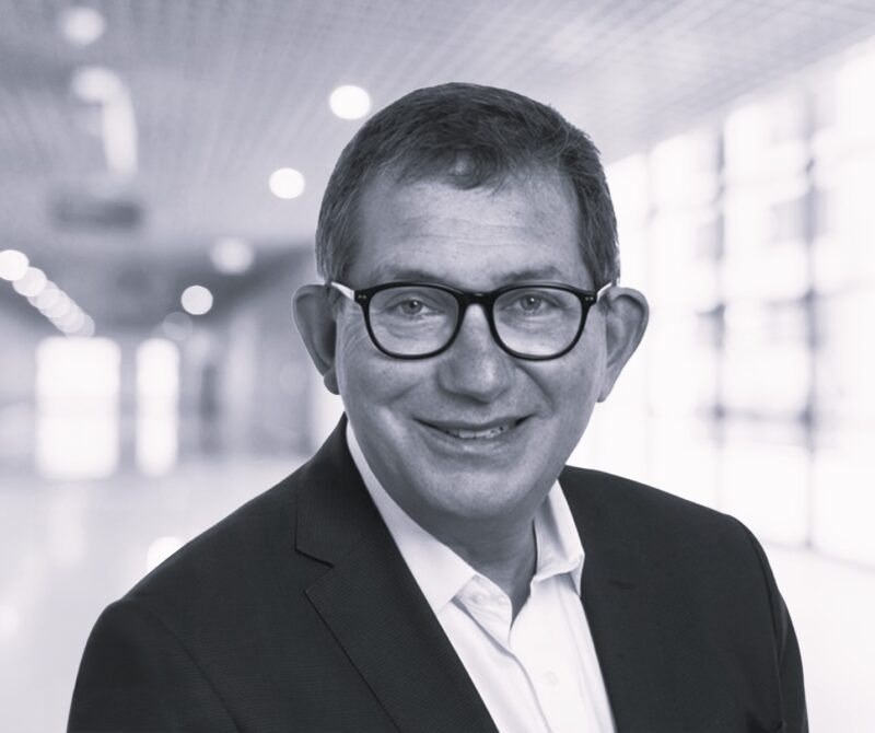 headshot of Prof Ian Jacobs in black and white