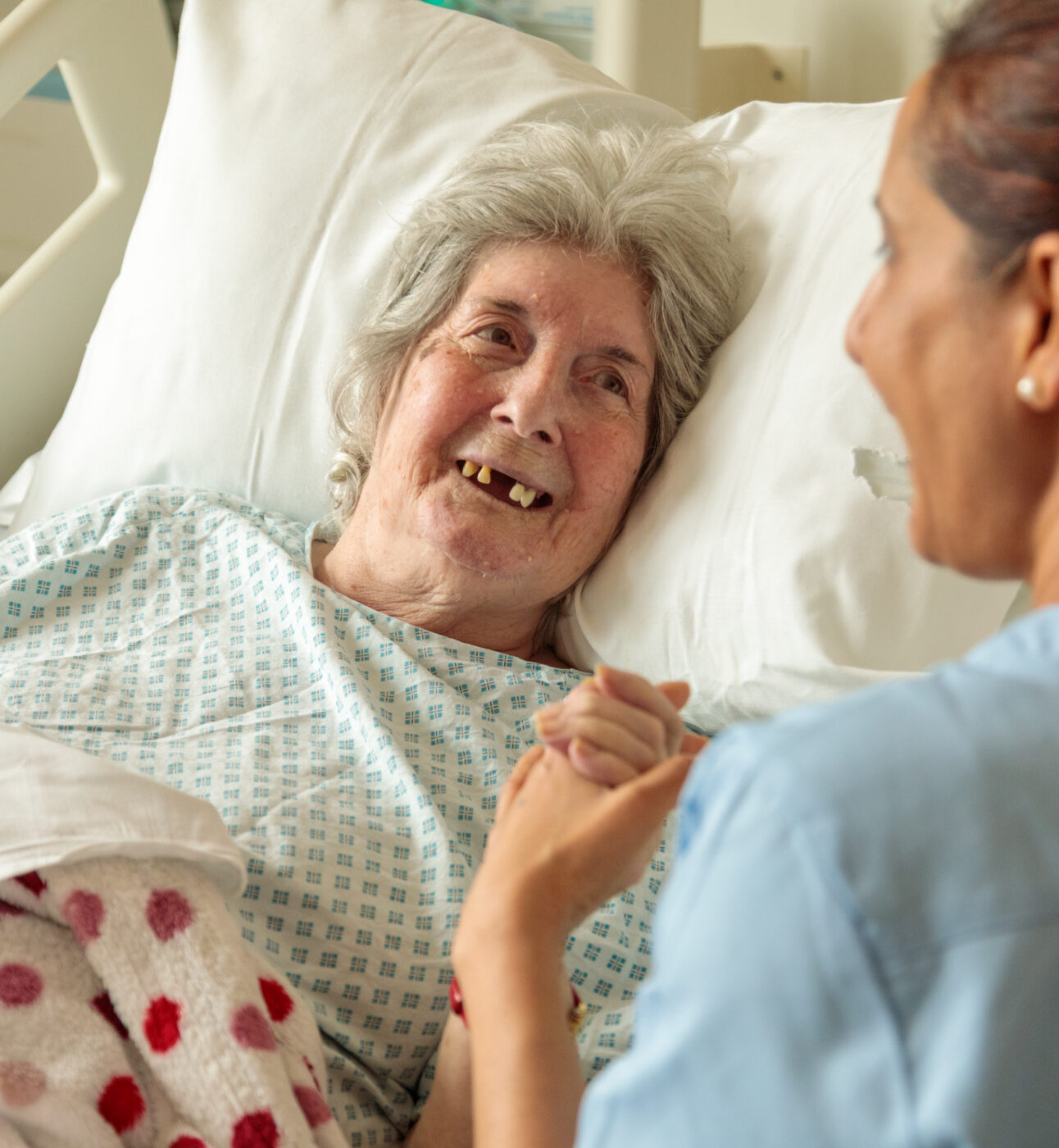 Patient Irene and Barts Health staff member Sirjana on the older people's ward.