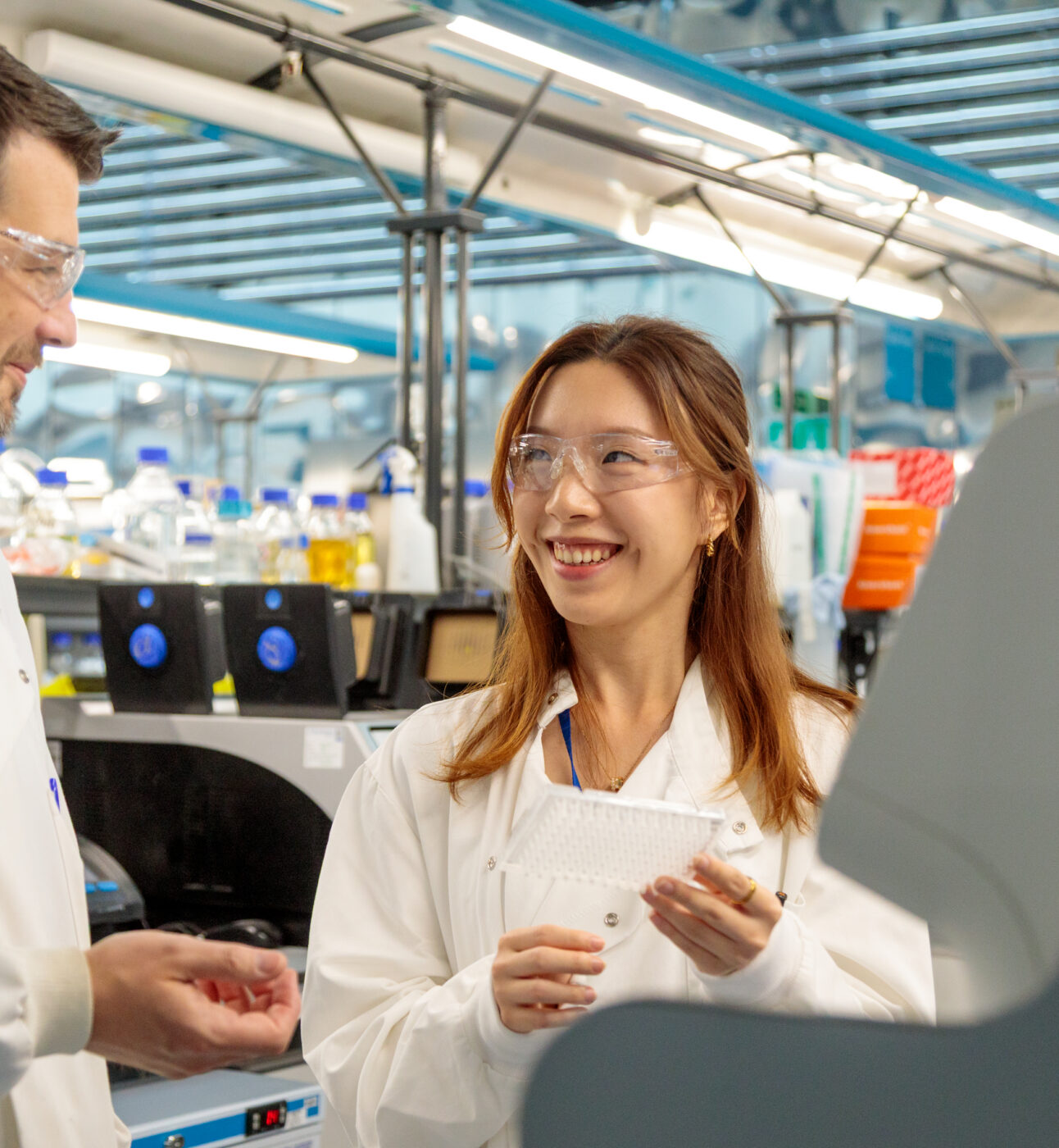 Two researchers at Queen Mary in the lab